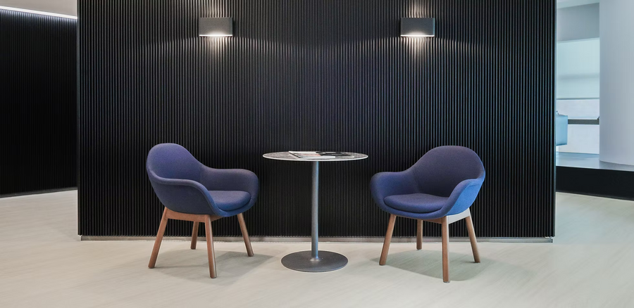 Bowler designer lounge chair by Matsu, designed by Joeri Reynaert, featuring a soft curved upholstered seat with premium Gabriel fabric