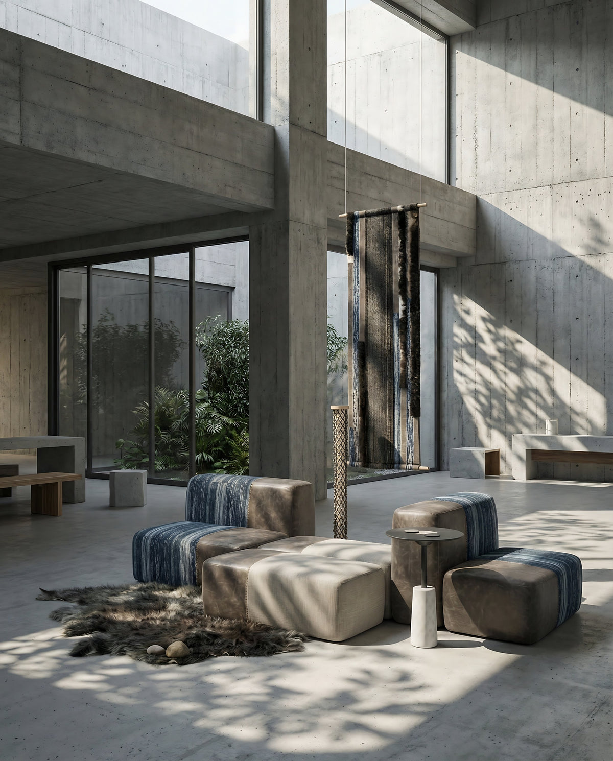 NOMAD Tea Table with NOMAD Cubes Set in a concrete atrium