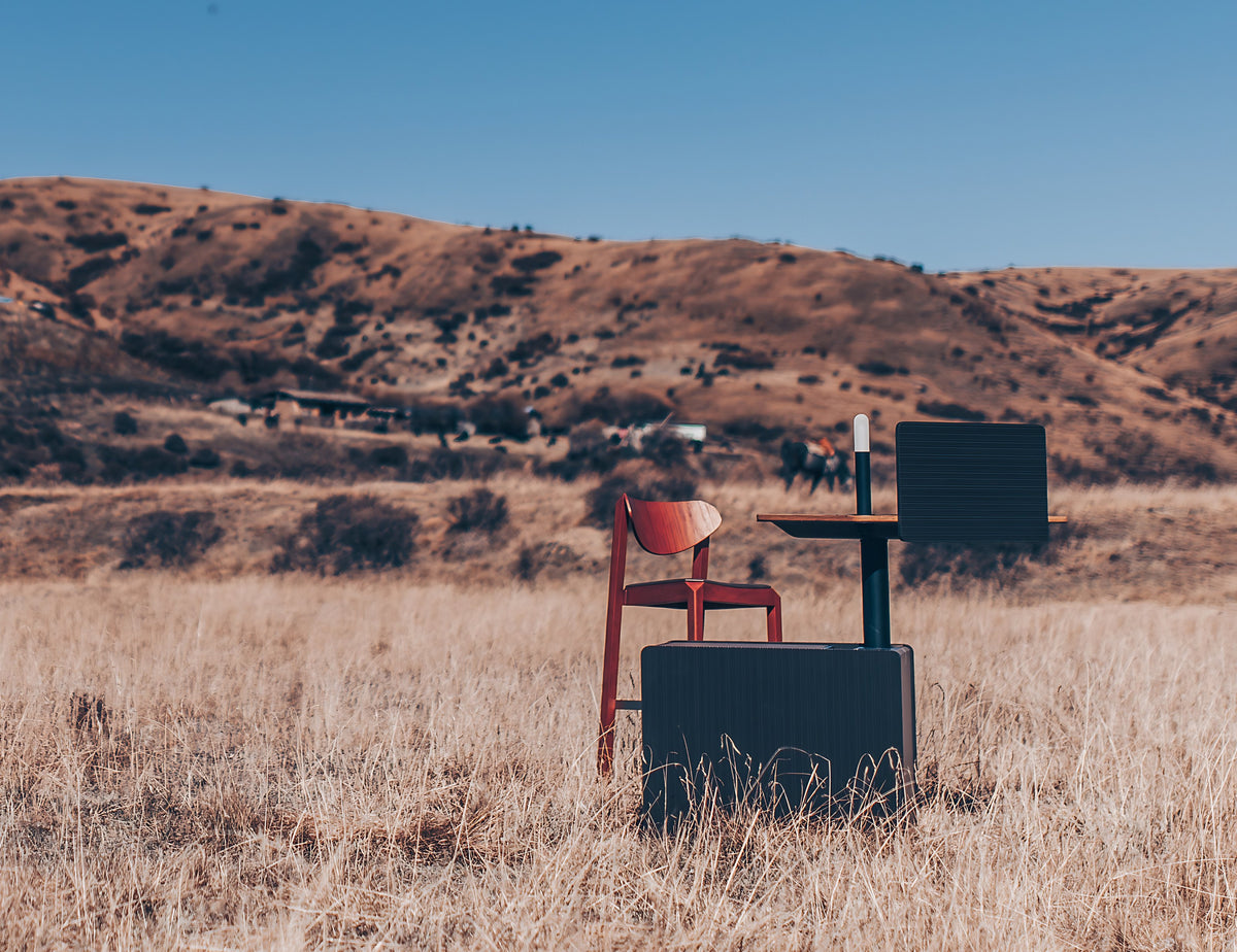 MATSU Boxwork Workstation in a highland grass landscape